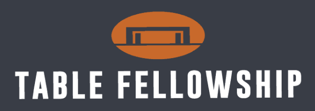 Table Fellowship Orange oval logo with a white table made from negative space all on a gray background